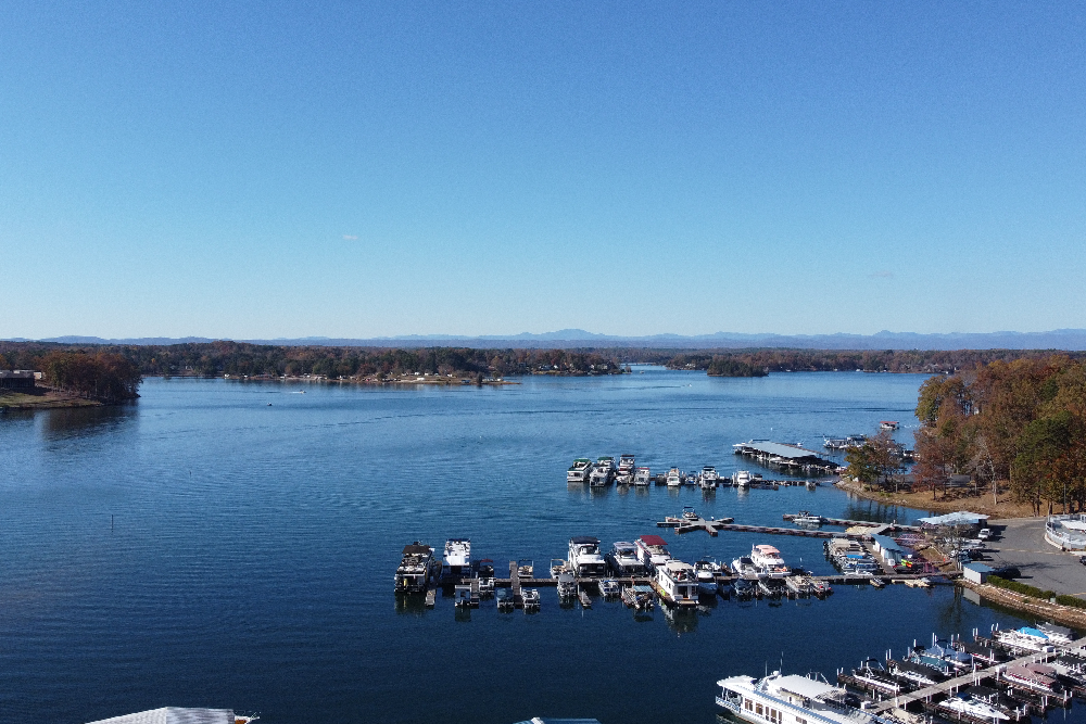 Scenic view of Lake Keowee showcasing sustainable boating practices for eco-friendly adventures