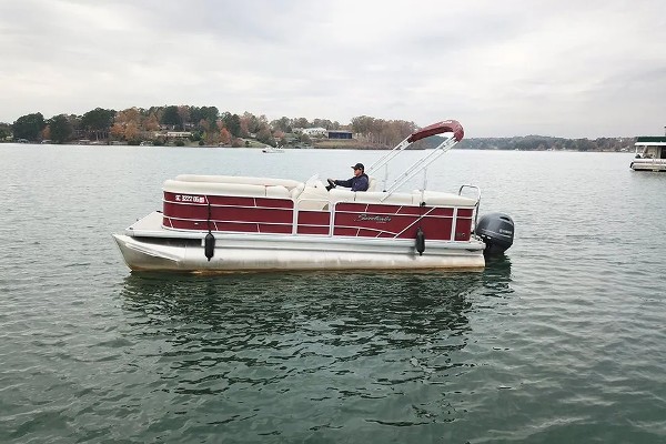 Red pontoon boat rental at Lake Keowee available from Keowee Marina for daily lake trips