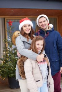 Family enjoying Christmas holidays at Lake Keowee surrounded by seasonal decor