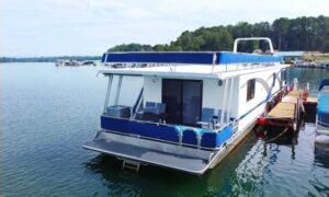Houseboat at Lake Keowee parked at the shore - Keowee Marina