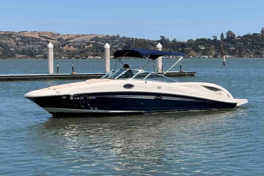 Recreational powerboat cruising on Lake Keowee during spring boating season - Keowee Marina