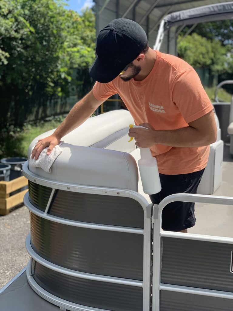 Staff detailing a pontoon