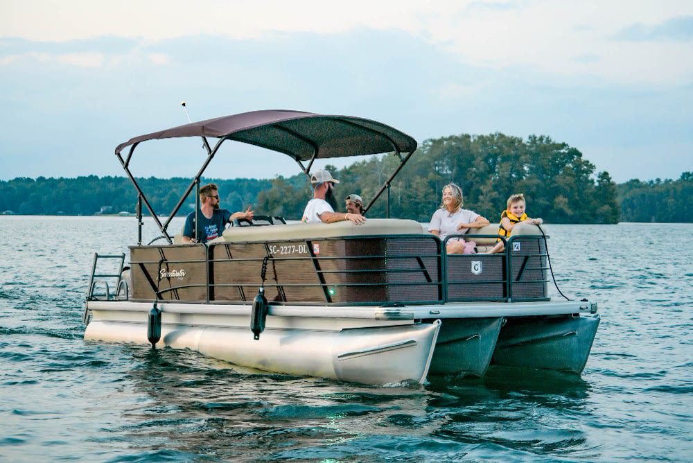 Rental tritoon cruising on Lake Keowee