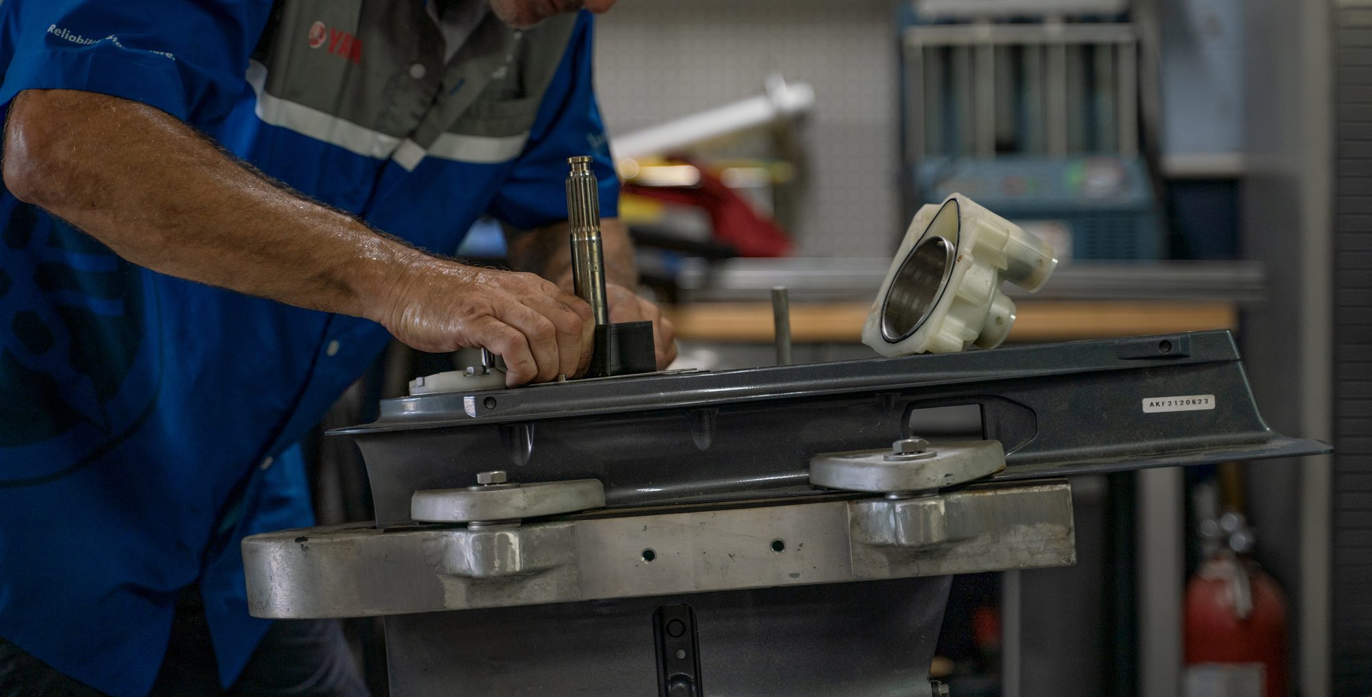 Technician working in the Keowee Marina service shop